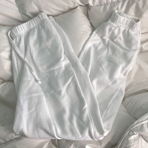 White high-rise Garage sweatpants.